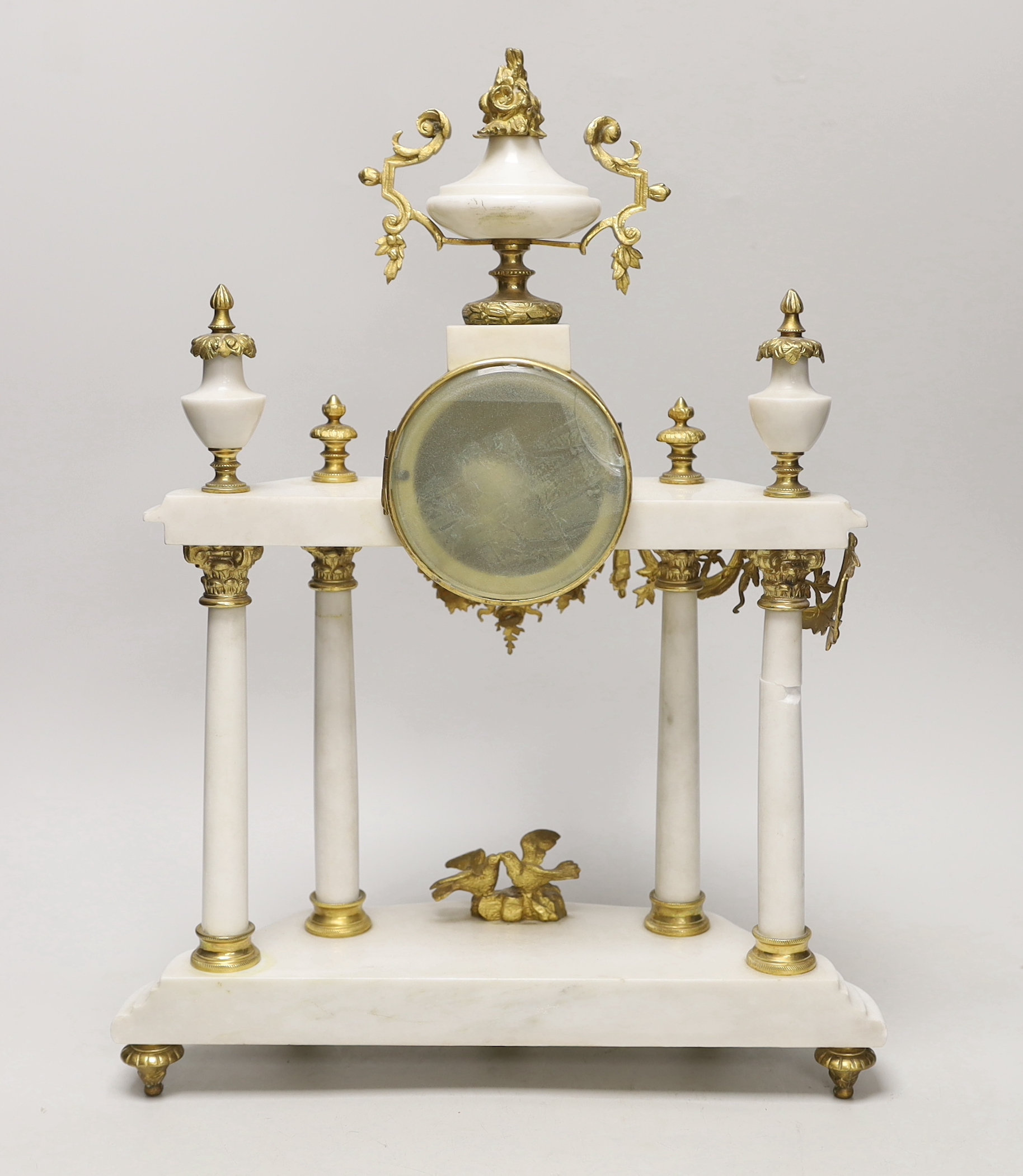 A 19th century French white marble mantel clock, 42cm